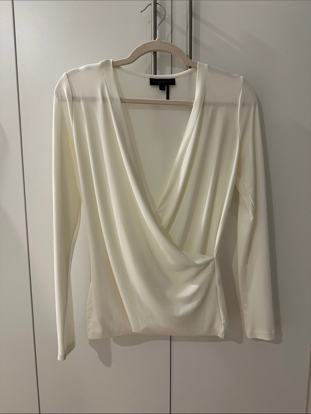 Worn once. Donna Karan Ivory Surplice Long Sleeve Top